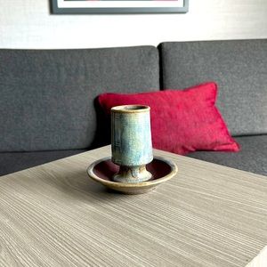 Stoneware match holder with striker